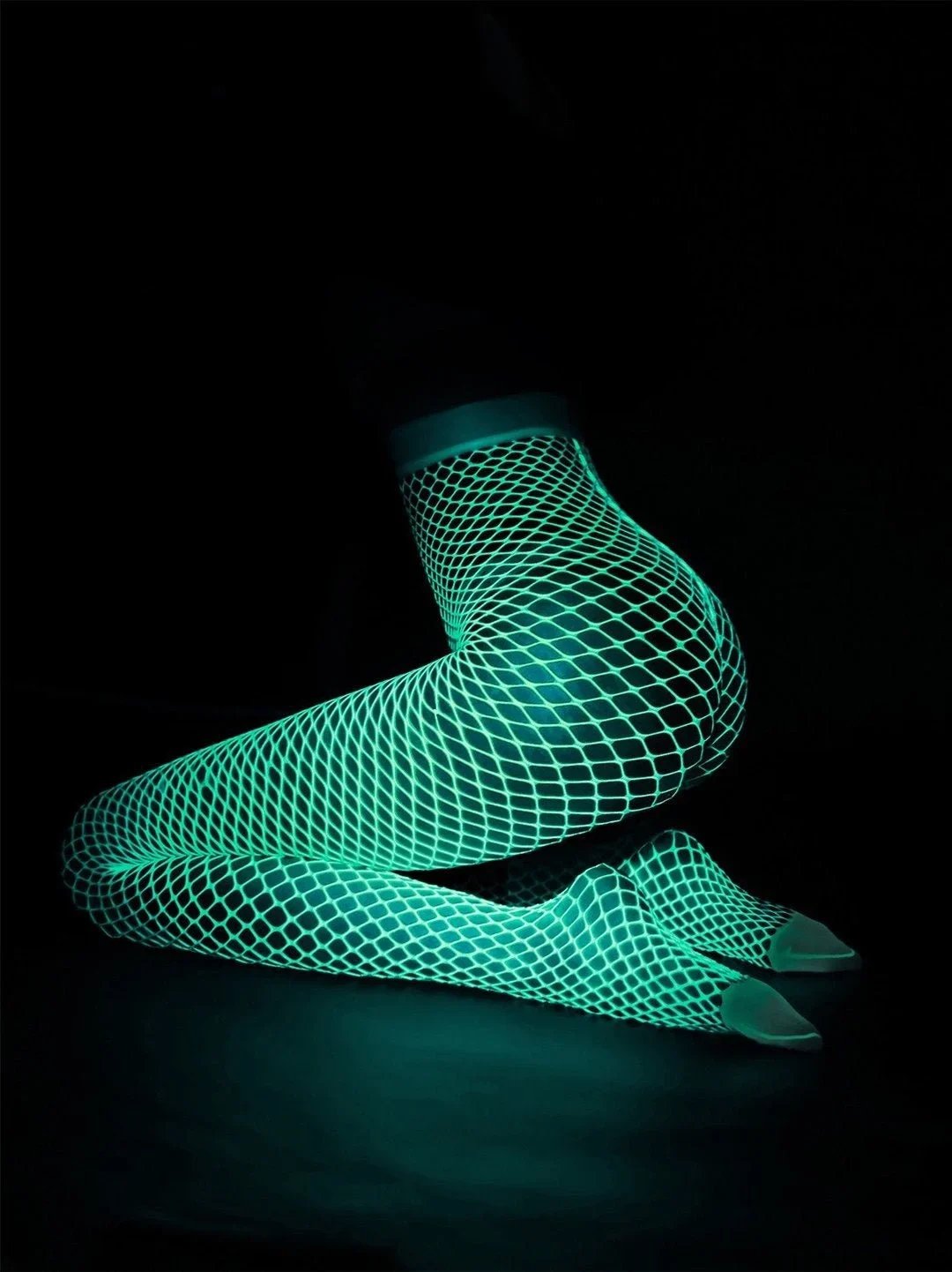 Glow-in-the-dark fishnet stockings